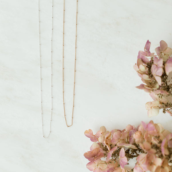 Twinkle gold and silver chain necklaces with flowers
