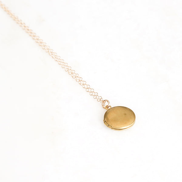 Small gold locket necklace