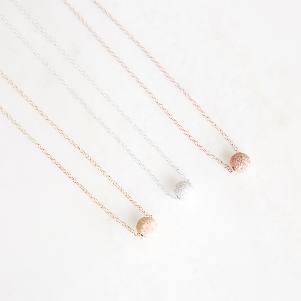 gold, silver, and rose gold aid necklaces