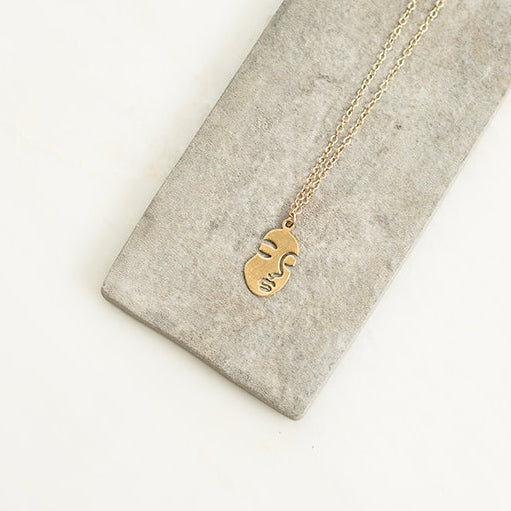 Reflection Gold face silhouette necklace
