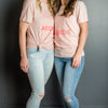 Two women in pink abide t shirts