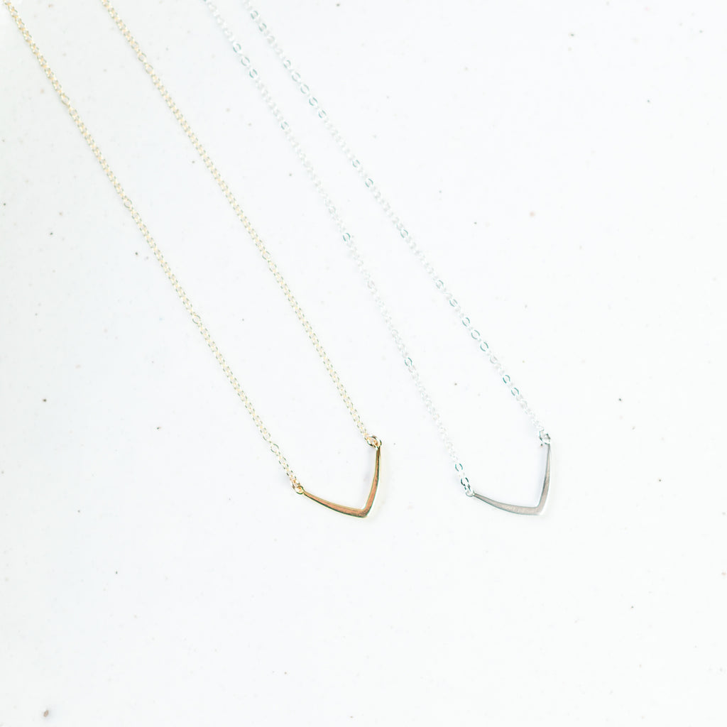 Gold and silver Gospel necklaces