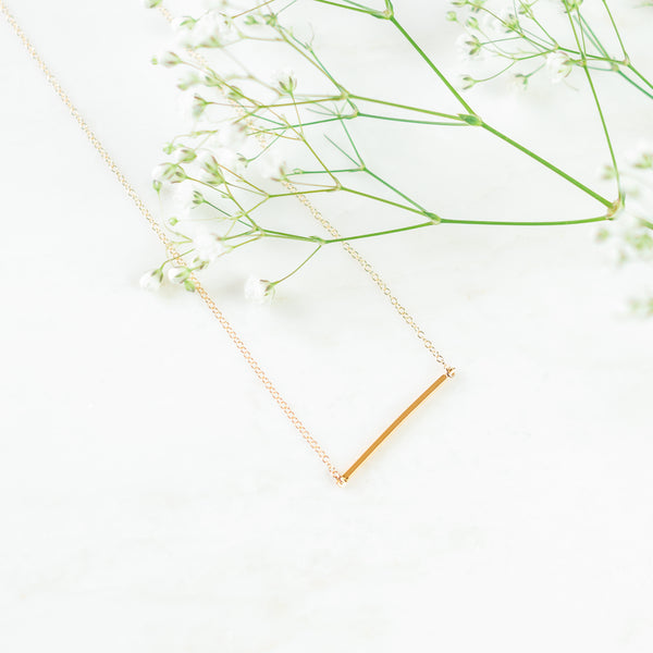 Gold Path bar necklace with flowers