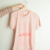 Pink abide t shirt on hanger