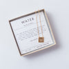 gold necklace square pendant with words come see engraved packaged on verse card in box
