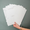 Woman holding Dear Mushka Prayer Pages