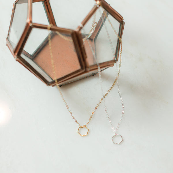 Gold and silver hexagon necklaces
