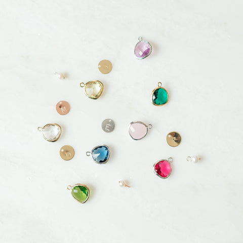 Images of gems and letter charms