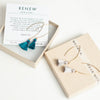 Teal and grey tassel earrings with verse card