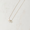 Keeper teardrop gold necklace with gold initial charm