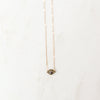 Enduring necklace with gold chain