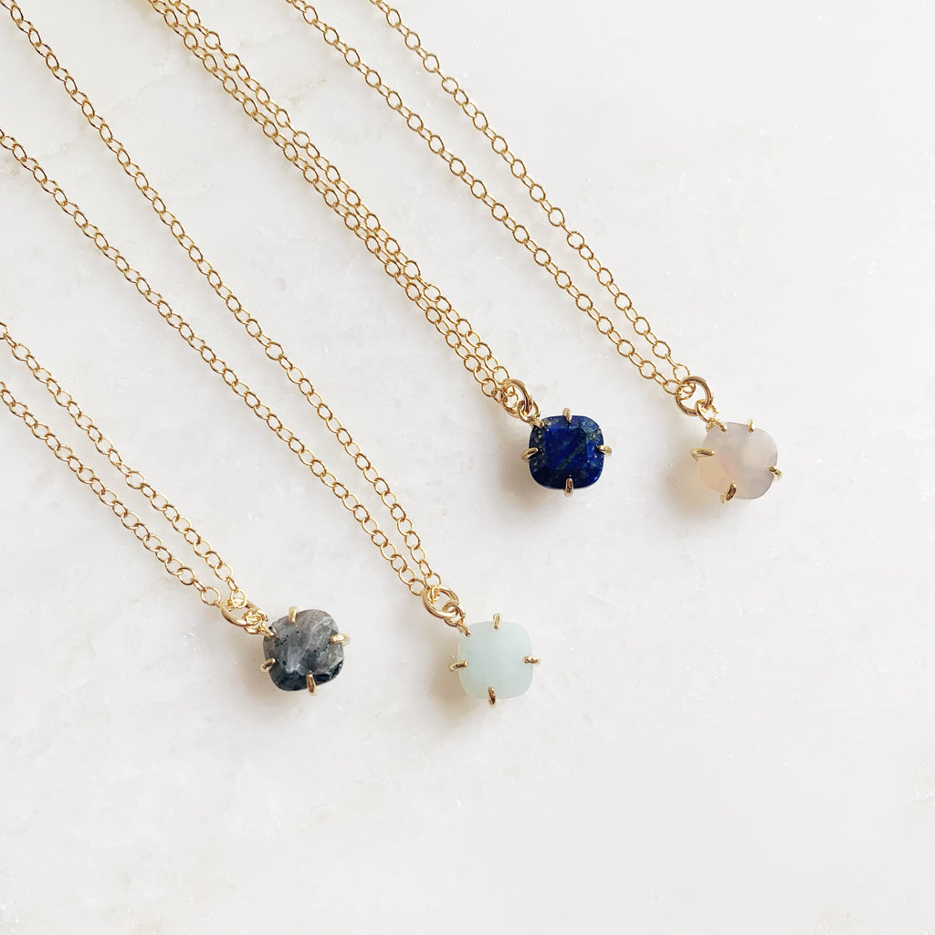 Guide stone and gold necklaces, grey, charcoal, mint, and navy