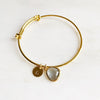No. 139 gold bracelet with initial tag